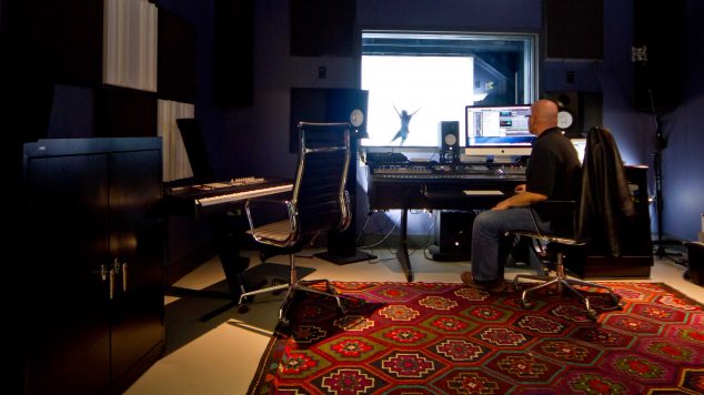 Photo of Audio Engineer in the recording studio at the IMRC Center